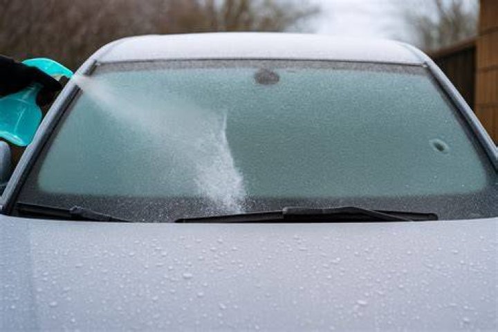 How do you melt ice off a car?