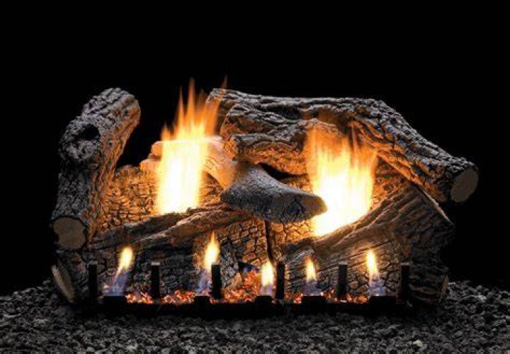 Why do ventless gas logs soot?